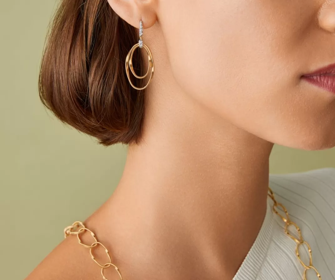 boucle_doreille_avec_elements_ovales_concentriques_et_crochet_en_diamants_2.webp Boucle D'Oreille Avec Elements Ovales Concentriques Et Crochet En Diamants*Marco Bicego New